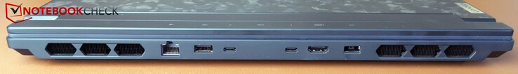 背面：电源、USB-A（5Gb/s，始终开启）、2 个 Thunderbolt 4（DP 1.4 和 PD 3.0 140 W）、HDMI 2.1、局域网