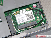 An mSATA drive has room above the wifi module.